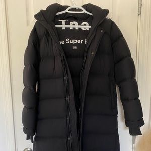 TNA Super Puff Long in Black!